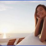oia sunset on santorini and woman tourist smiling pretty lady enjoying caldera sunset view from resort relaxed female is on vacation travel holiday on the famous greek island in greece europe rtdehtqa 150x150 FEMALE TRAVEL QA LADIES, YOU NEED TO KNOW THIS